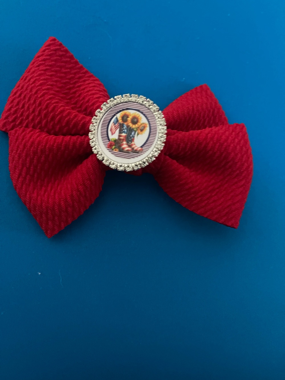 Red Bow Hair Clip with Decorative Sunflower Center